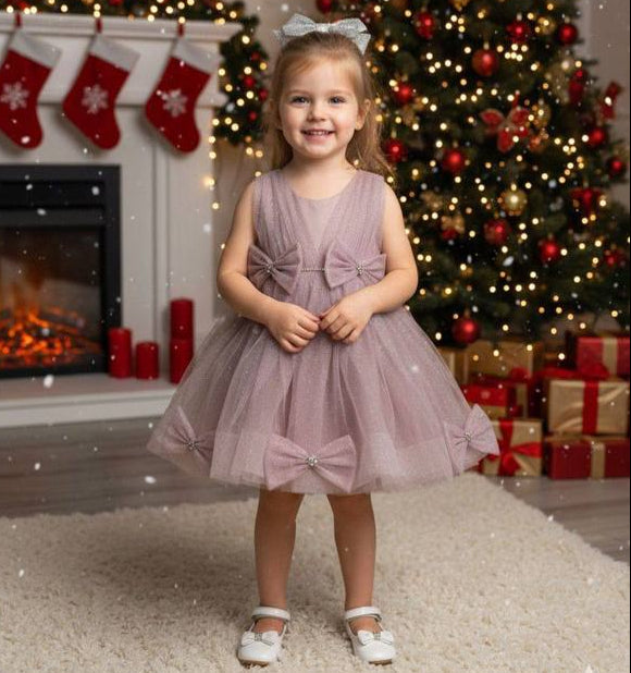 Robe de fête à nœuds fille mauve, vue de face avec jupe ample