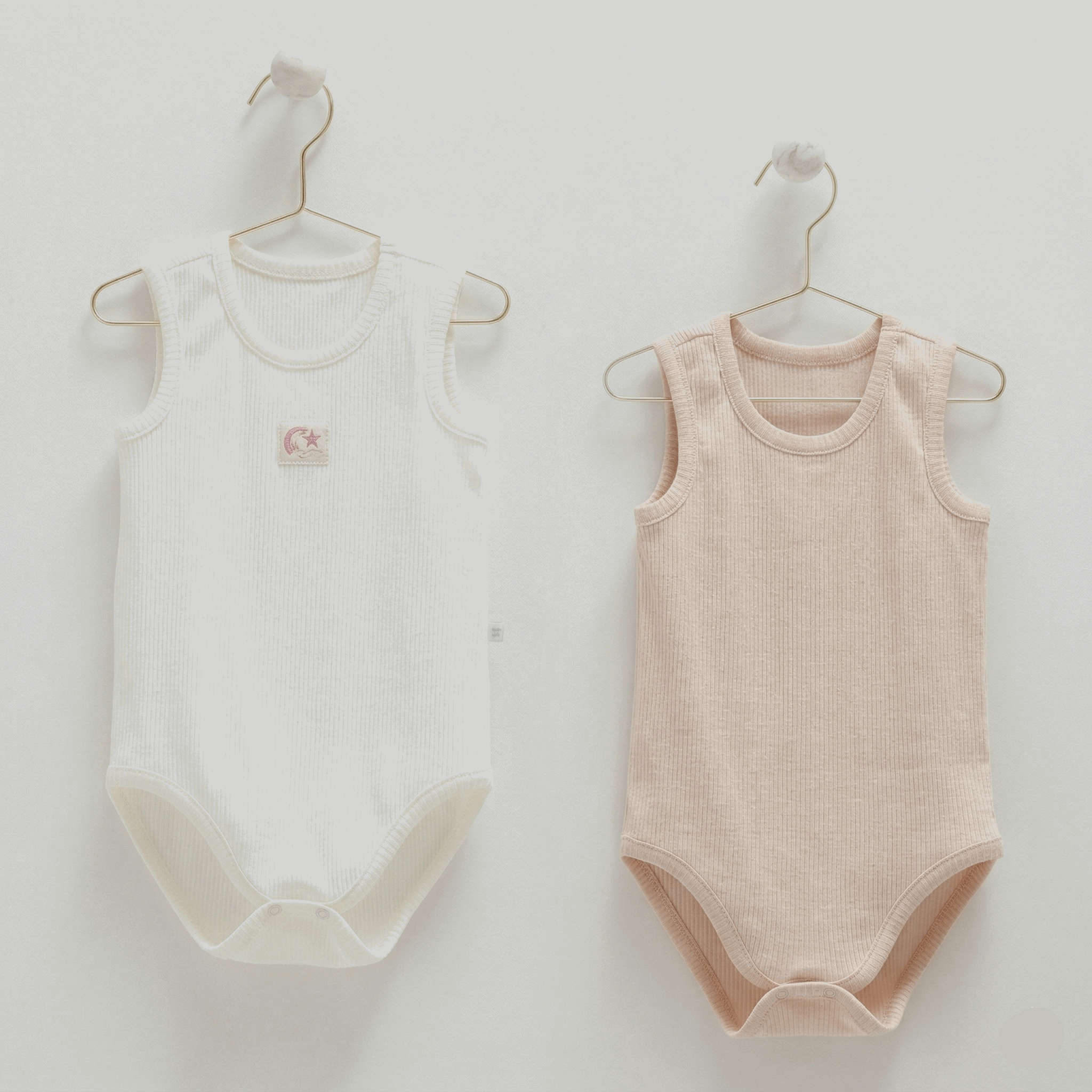 Lot de 2 bodies bébé sans manches