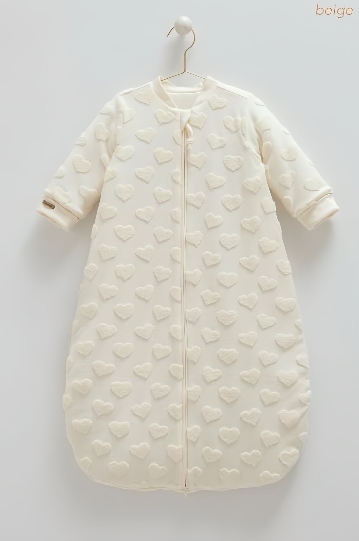 Gigoteuse bébé Caramell beige à cœurs en relief et glissière centrale